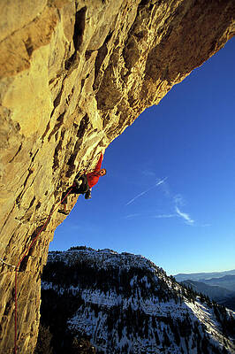 Wall Art - Photograph - A Man Rock Climbing A Difficult #3 by Corey Rich