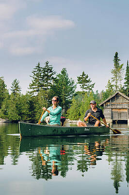 Wall Art - Photograph - Young Couple Canoeing With Their Dog #4 by Corey Hendrickson