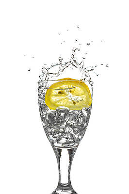 Wall Art - Photograph - Slice of lemon in Glass #6 by Peter Lakomy