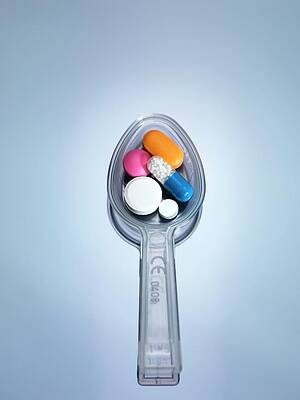 Wall Art - Photograph - Spoonful Of Medicine by Tek Image/science Photo Library