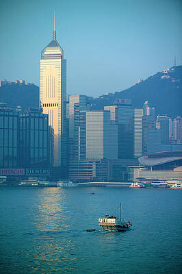 Wall Art - Photograph - A Junk In The Hong Kong Harbor by Jonathan Kingston