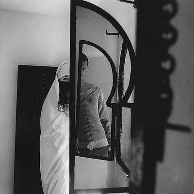 Wall Art - Photograph - A Male Model Posing In A Mirror With A Woman by Chadwick Hall