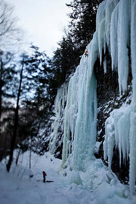 Wall Art - Photograph - A Man Climbing A Steep Ice Pillar by Christopher Beauchamp