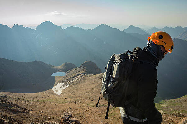 Wall Art - Photograph - A Man Descending From The Summit by Taylor Reilly