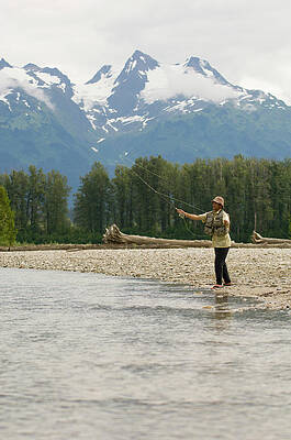 Wall Art - Photograph - A Man Fly Fishes A Stream by Doug Marshall