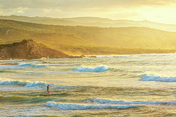 Wall Art - Photograph - A Man Has A Sup Session At The End by Daniele Molineris