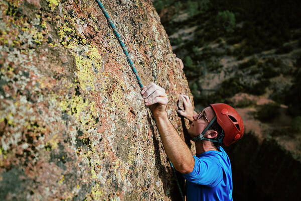 Wall Art - Photograph - A Man Rock Climbing In Pinnacles by Ryan Tuttle