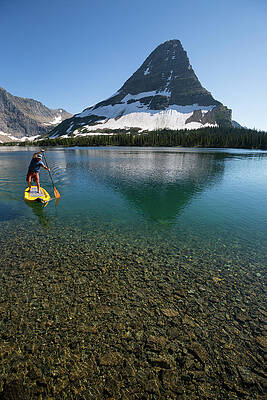 Wall Art - Photograph - A Man Stand Up Paddle Boards Sup by Craig Moore
