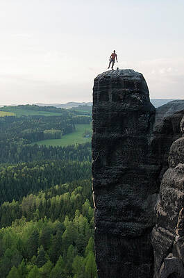 Wall Art - Photograph - A Man Stands On Top Of A Tower Summit by Topher Donahue