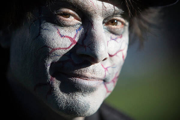 Wall Art - Photograph - A Man With Horror Make Up On His Face by Ron Koeberer