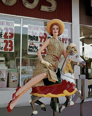 Wall Art - Photograph - A Model Sitting On A Rocking Horse by George Barkentin