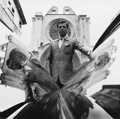 Wall Art - Photograph - A Model Standing In Front Of A Cathedral by Leonard Nones