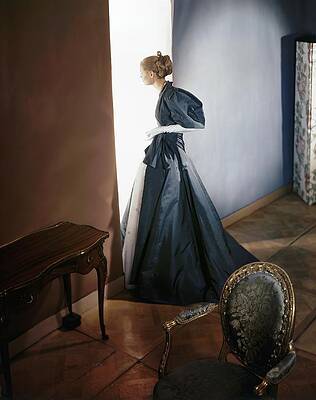Wall Art - Photograph - A Model Wearing A Slate Gray Coat by Horst P Horst