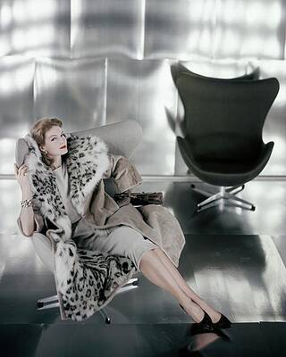 Wall Art - Photograph - A Model Wearing A Snow Leopard Coat by Henry Clarke