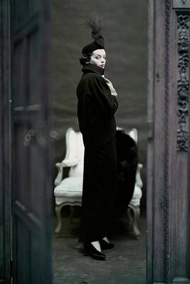 Wall Art - Photograph - A Model Wearing An Adele Simpsons Ensemble by John Rawlings