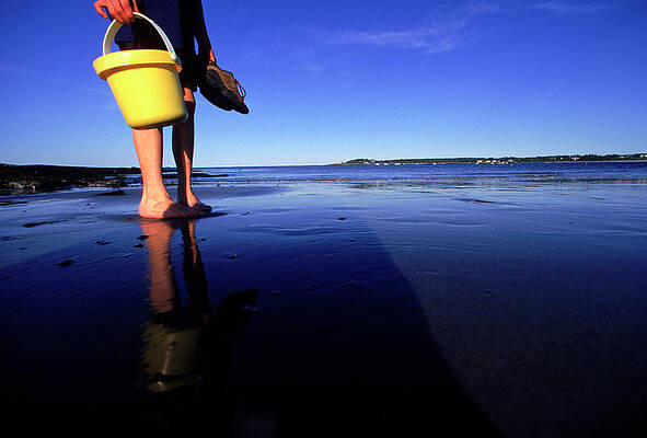 Wall Art - Photograph - A Person Stands On A Beach With A Pair by Jose Azel