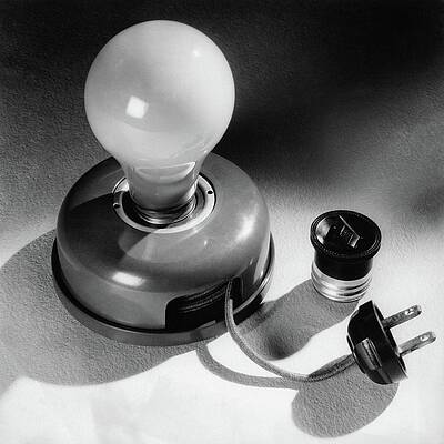 Wall Art - Photograph - A Portable Light Socket by Maurice Seymour