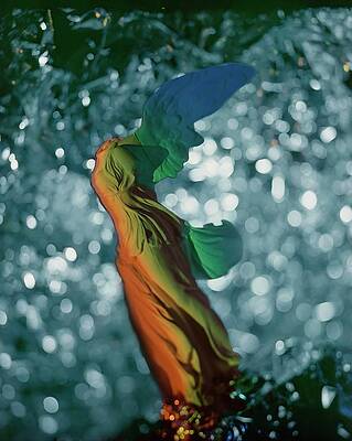Wall Art - Photograph - A Sculpture Of An Angel With No Head by Erwin Blumenfeld