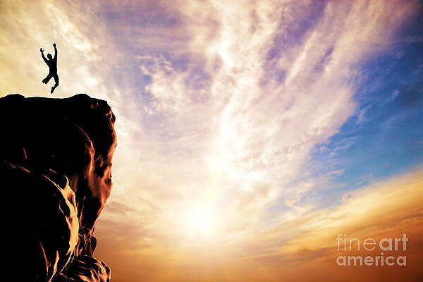 Wall Art - Photograph - A silhouette of a man jumping for joy on the peak of the mountain by Michal Bednarek