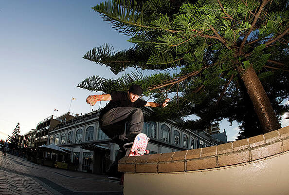 Wall Art - Photograph - A Skateboarder Slides The Pavement by Krystle Wright