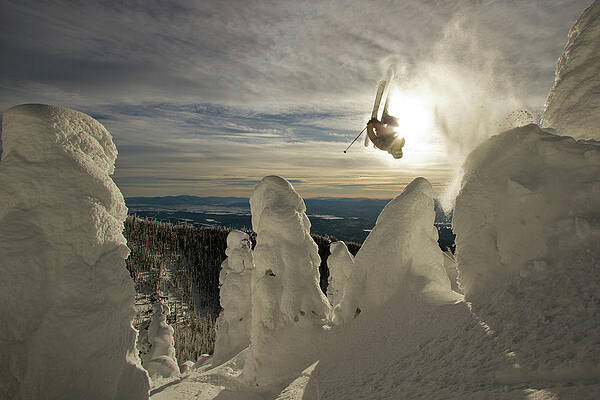 Wall Art - Photograph - A Skier Throws A Backflip Off Of A Jump by Noah Couser