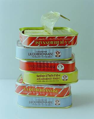Wall Art - Photograph - A Stack Of Cans Of Sardines by Romulo Yanes