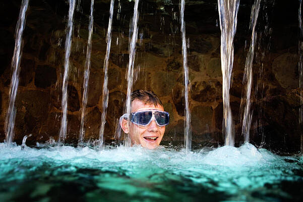 Wall Art - Photograph - A Swimmer Enjoys The Pool In Cabo San by Jay Reilly