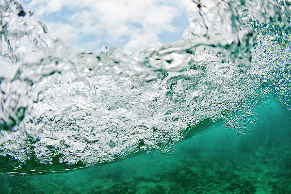 Wall Art - Photograph - A Wave Is Seen Breaking From Underwater by Logan Mock-Bunting