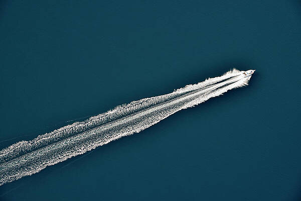 Aerial View Of A Speeding Motorboat On Print by Sami Sarkis