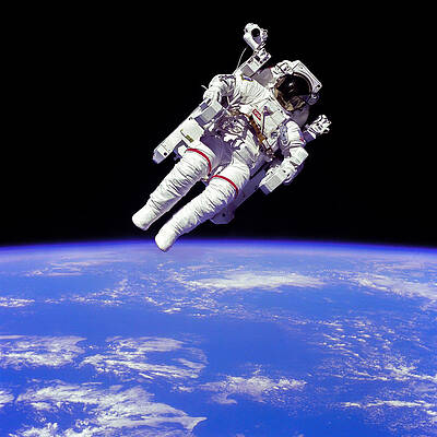 Wall Art - Photograph - Astronaut In Space by Chad Rowe