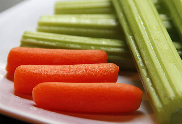 Wall Art - Photograph - Baby Carrots And Celery Stalks by Science Source
