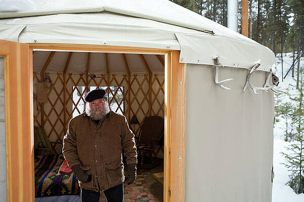 Wall Art - Photograph - Bearded Man With Hat In Sparse Yurt by Heath Korvola