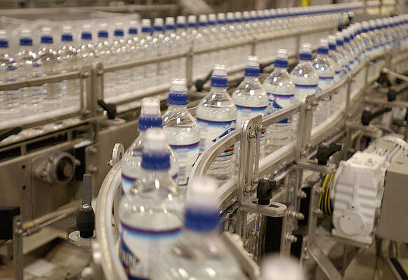 Wall Art - Photograph - Bottled Water Processed In Michigan by Darron R. Silva