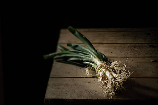 Wall Art - Photograph - Bunch Of Spring Onions Tied With by Westend61