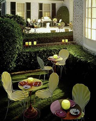 Wall Art - Photograph - Chairs And Tables In A Garden by Ernst Beadle