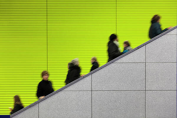 Wall Art - Photograph - Civilians Riding An Escalator With A by Sebastian-julian