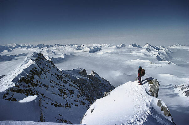 Wall Art - Photograph - Climber On The Summit Of Mt Shinn by Colin Monteath