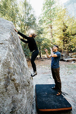 Wall Art - Photograph - Climbers Bouldering On Birdwell Boulder by Ryan Tuttle