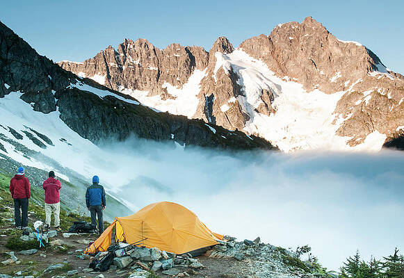 Wall Art - Photograph - Climbers Scouting Thier Route While by Josh Miller