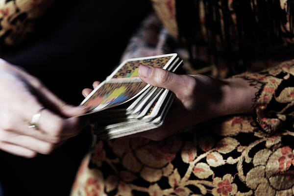 Wall Art - Photograph - Close-up Of A Womans Hands Dealing by Ron Koeberer