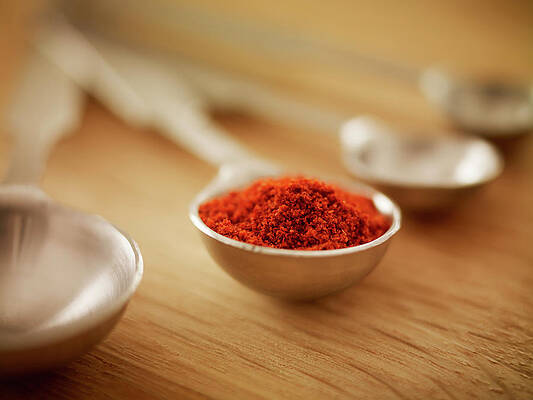 Wall Art - Photograph - Close Up Of Spice In Measuring Spoon by Adam Gault