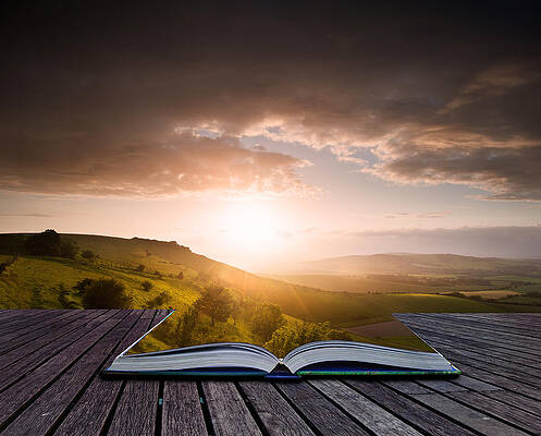 Creative concept image of Summer landscape in pages of book by Matthew Gibson
