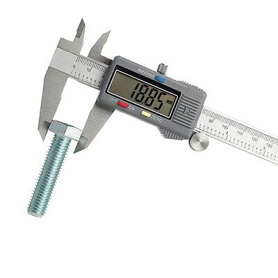 Wall Art - Photograph - Digital Caliper Measuring A Bolt by Science Photo Library