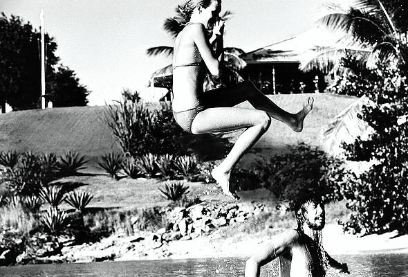 Wall Art - Photograph - Donna Garrett Jumping Into Swimming Pool by Mike Reinhardt