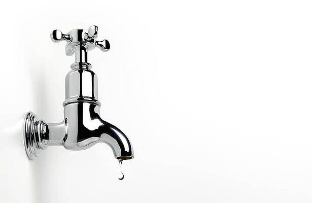 Wall Art - Photograph - Dripping Tap With Copy Space by Peter Dazeley