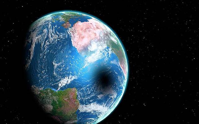 Wall Art - Photograph - Earth From Space During An Eclipse by Science Photo Library