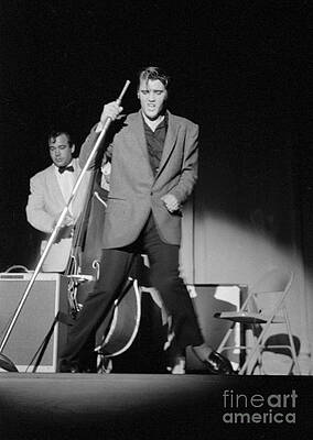 Elvis Presley and Bill Black performing in 1956 by The Harrington Collection Elvis Presley and Bill Black performing in 1956 by The Harrington Collection