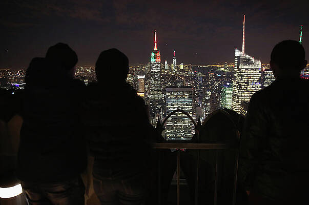 Wall Art - Photograph - Empire State Bldg Lit Orange And Green by John Moore