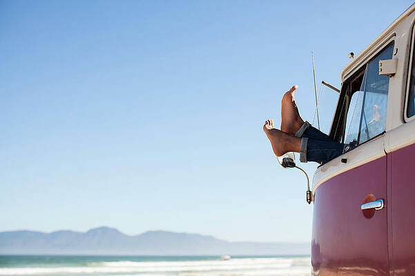 Wall Art - Photograph - Feet Sticking Out Of Camper Van Window by David Lees