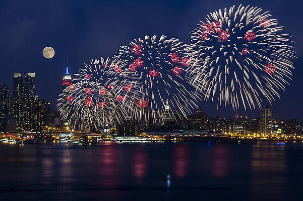 Wall Art - Photograph - Fireworks and Full Moon Over New York City by Susan Candelario